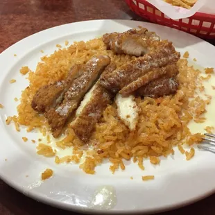 Crispy chicken. It's good and cheap.  6.99 is a great value for this meal.  Try it out.  It's similar to polo loco but cheaper.