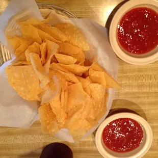 Thin chips. Light salsa, not spicy and no cilantro (I prefer no cilantro).