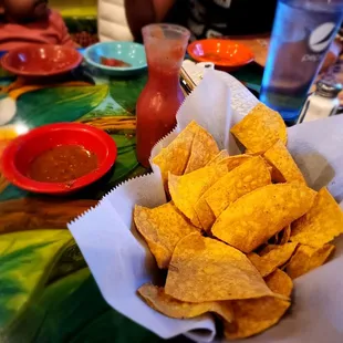 a bowl of nachos on a table