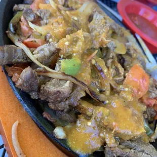 Steak fajitas. Pro Tip: Ask for the house hot sauce to drizzle over it. You're welcome. #UpCloseSavor XP