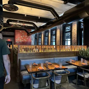 a man walking through a restaurant