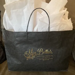 My pancho/sweater and hubby's wallet.