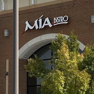 a brick building with a clock tower