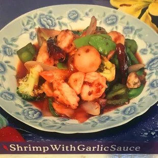 shrimp with garlic sauce on a plate