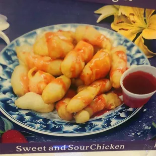 a plate of sweet and sour chicken