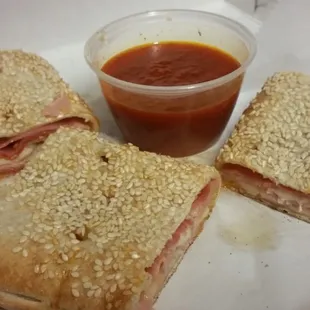 Sliced Sicilian Stromboli! Love the sesame encrusted dough. Excellent.