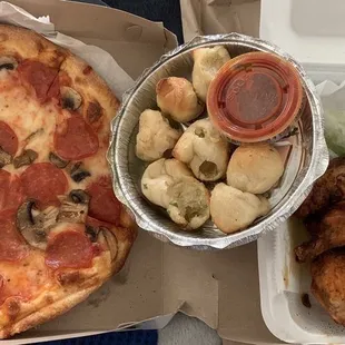 Small pepperoni and mushroom pizza, 8 garlic knots, 10 bbq wings.