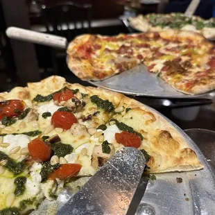 Pesto chicken, diavola, and fig pizza
