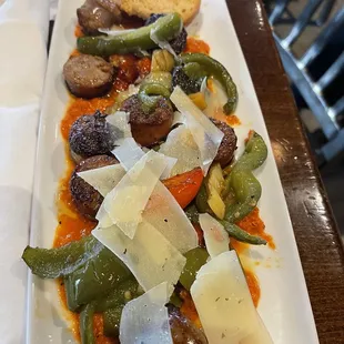 a plate of meat and vegetables