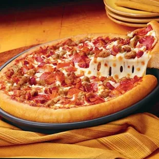 a slice of pizza on a plate