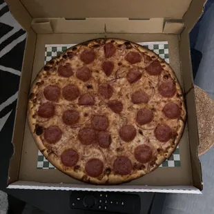 14" pepperoni and onion pizza.