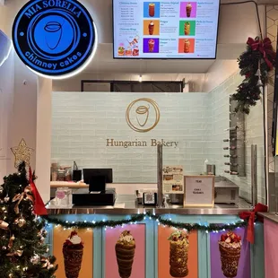 the front counter of a bakery