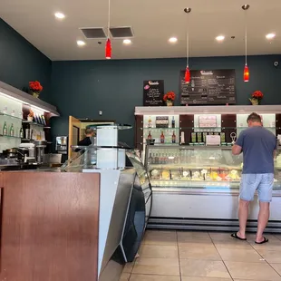 a man standing in front of a counter