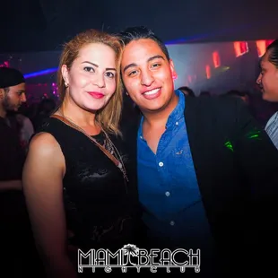a man and a woman posing for a picture
