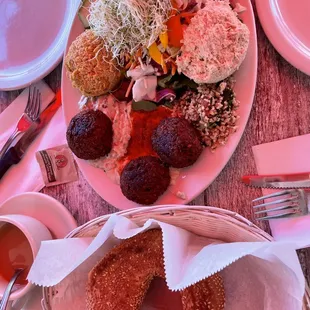 Combination platter One Scoop of Tuna Salad, One Scoop of Chicken Salad, hummus, House Salad with Babaganoush and Sesame Bagel (Israeli)