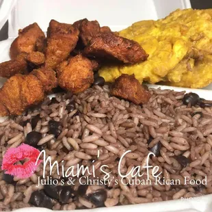Cuban Rican Food Congri Rice , pork Chunks, plantains or sweet bananas ..