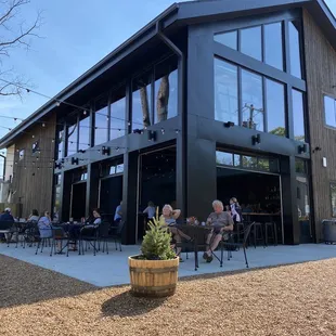 people sitting outside a restaurant