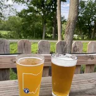 Beer, and bike trail in background