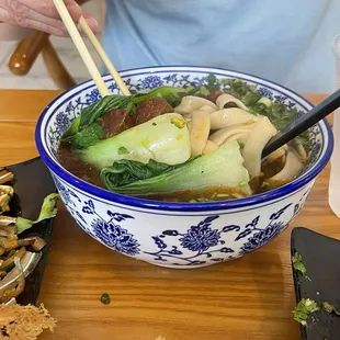 Braised beef with wide noodles