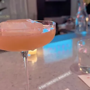 a cocktail in a coupe glass