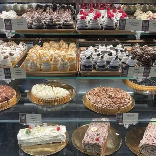 a display of cakes and pastries