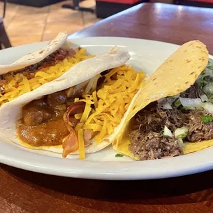 L-R: choriquiles taco, &quot;El Rey&quot; taco, barbacoa taco.
