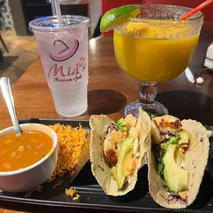 Shrimp tacos and a mango margarita
