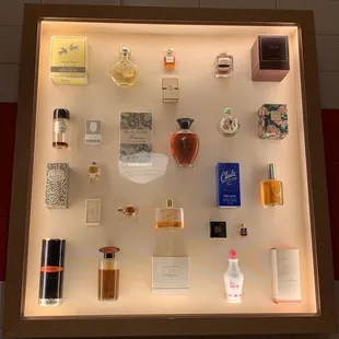 a display of various perfumes