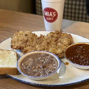 Chicken fried streak, baked and black eyed peas