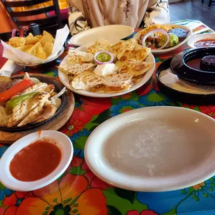 Shrimp quesadillas and combo fajitas with black beans.