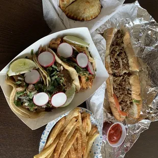 Tacos, empanadas, Philly cheesesteak, and fries... yummy