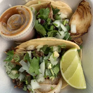 Carnitas tacos. Red salsa was hot and tasty. Great pit stop before a movie. Cheaper and better tasting then the concessions.