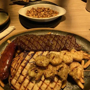 Steak, chicken, shrimp, sausage and fries!!