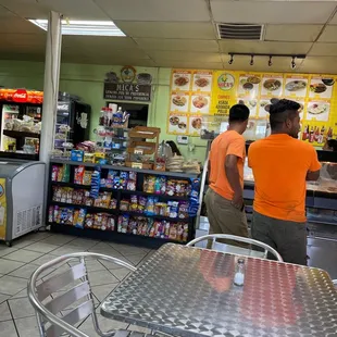 two men in orange shirts