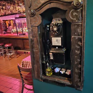 Old school rotary phone operated by a dime.