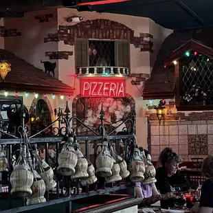 people sitting at a table in a restaurant