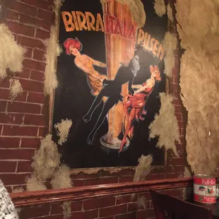 This is a wall. It is painted like brick.