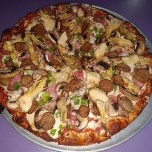 Salami meatball artichoke mushroom green pepper pizza. Excellent.