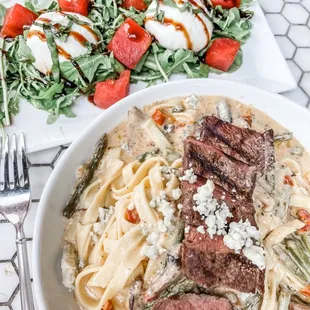 Buratta cheese and steak pasta with blue cheese sauce.