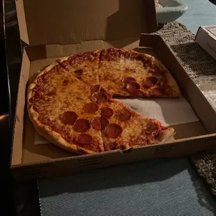 Half pepperoni &amp; half cheese pizza