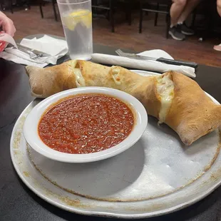 Stromboli super with sausage,pepperoni,peppers &amp; more