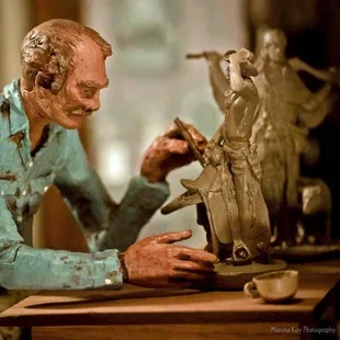 Sculpture of Michael Garman inside Magic Town.