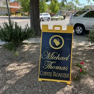a sign for michael thomas coffee roaster