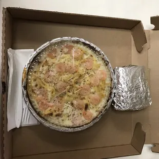 Shrimp alfredo served with garlic bread &amp; personal salad..