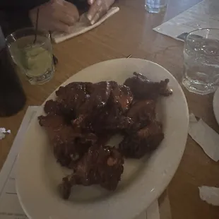 This is our 2nd order of sriracha honey wings! They are ridiculously delicious.