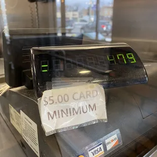 a checkout counter with a credit card on it