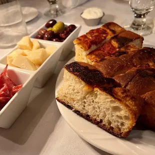 Bread and small deli treats before we ordered.