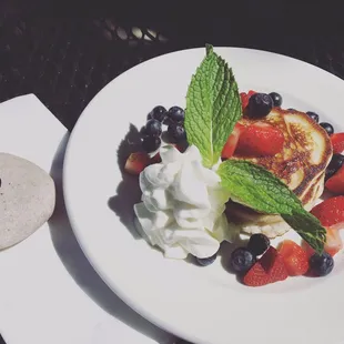 Contemporary ranch style ricotta pancakes with amazing limoncello-habanero syrup... Pure indulgence.  Perfect brunch.