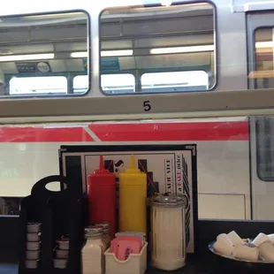 Because all good diners should have a train pass right by it