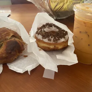 Ham cheese jalapeño croissant, Raised Donut with coco pebbles, Thai Iced Tea